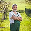 portrait of a senior gardener in his garden/orchard (color toned image)