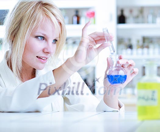 portrait of a female researcher/chemistry student carrying out research in a lab portrait of a female researcher/chemistry student carrying out research in a lab