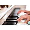 Playing Piano (shallow DOF; color toned image)