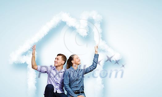 Conceptual image of young couple hugging each other and dreaming Conceptual image of young couple hugging each other and dreaming