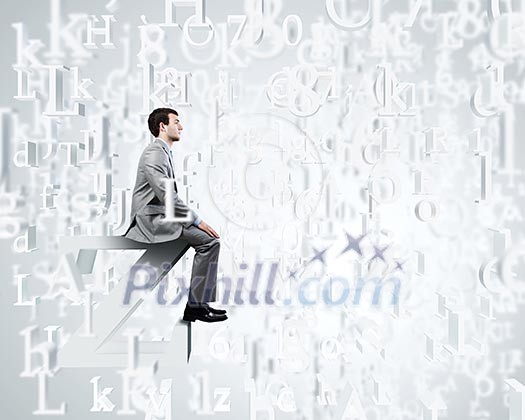 Young businessman sitting on huge white letter. Email concept Young businessman sitting on huge white letter. Email concept