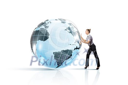 Young successful businesswoman pushing Earth planet ball Young successful businesswoman pushing Earth planet ball