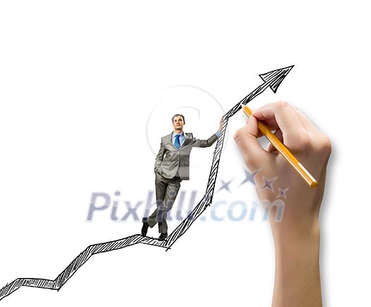 Young businessman standing on drawn graph arrow Young businessman standing on drawn graph arrow