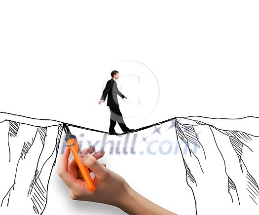 Brave businessman walking on rope above mountain gap Brave businessman walking on rope above mountain gap