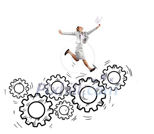 Young businesswoman jumping above hand drawn gears Young businesswoman jumping above hand drawn gears