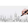 Close up of businesswoman hand drawing sketches with marker