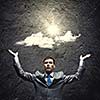 Young handsome businessman wit sun shining above head
