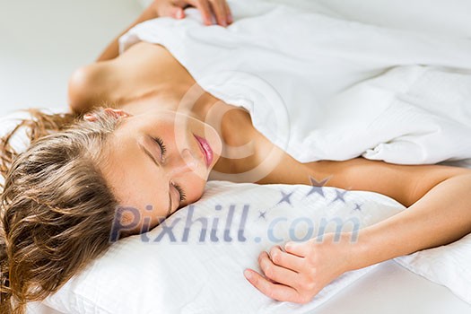 Beautiful young woman sleeping in bed Beautiful young woman sleeping in bed