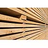 Stack of new wooden studs at the lumber yard