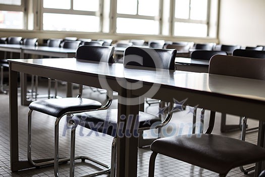 Empty classroom with chairs and desks Empty classroom with chairs and desks