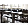 Empty classroom with chairs and desks