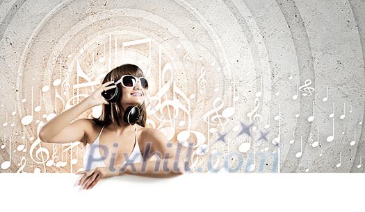 Young pretty girl in bikini with blank white banner Young pretty girl in bikini with blank white banner
