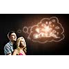 Conceptual image of young couple hugging each other and dreaming