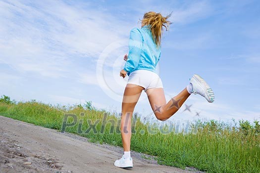 Young beautiful girl training outdoor in summer Young beautiful girl training outdoor in summer