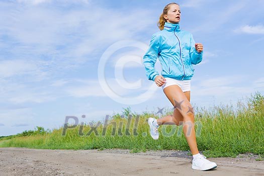 Young beautiful girl training outdoor in summer Young beautiful girl training outdoor in summer