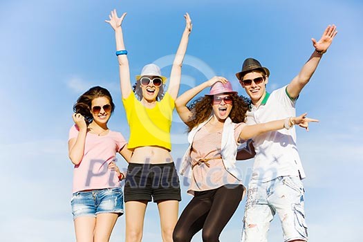 Young happy people having fun outside in summer Young happy people having fun outside in summer