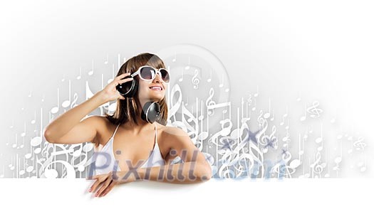 Young pretty girl in bikini with blank white banner Young pretty girl in bikini with blank white banner