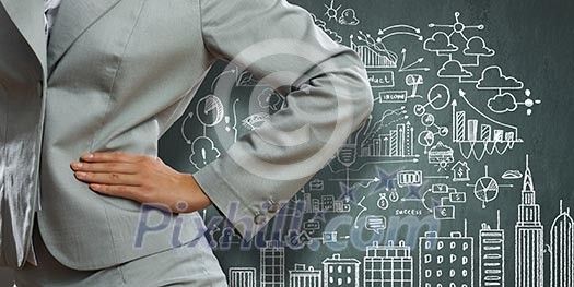 Businesswoman against sketch background. New idea and strategy Businesswoman against sketch background. New idea and strategy