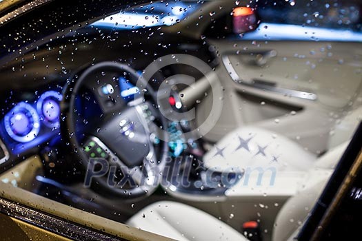 Modern car interior (shallow DOF - selective focus; color toned image) Modern car interior (shallow DOF - selective focus; color toned image)