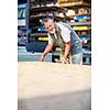 Man buying construction wood in a  DIY store