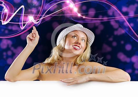 Nude girl standing behind white blank banner. Place for text Nude girl standing behind white blank banner. Place for text