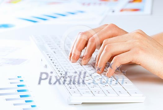 Close up of female hands typing on keyboard Close up of female hands typing on keyboard