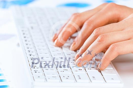 Close up of female hands typing on keyboard Close up of female hands typing on keyboard