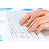 Close up of female hands typing on keyboard