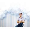 Young man in casual dreaming about future