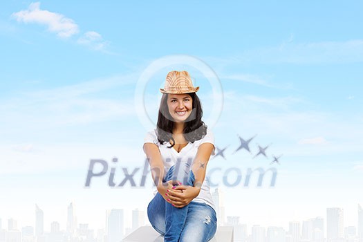 Young pretty lady in hat dreaming about future Young pretty lady in hat dreaming about future
