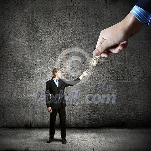 Close up of hand giving money to businessman Close up of hand giving money to businessman