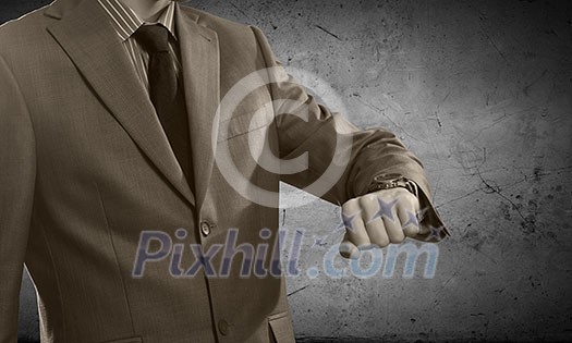 Close up of businessman looking at watch Close up of businessman looking at watch