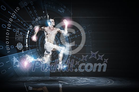 Young running man against digital media background Young running man against digital media background