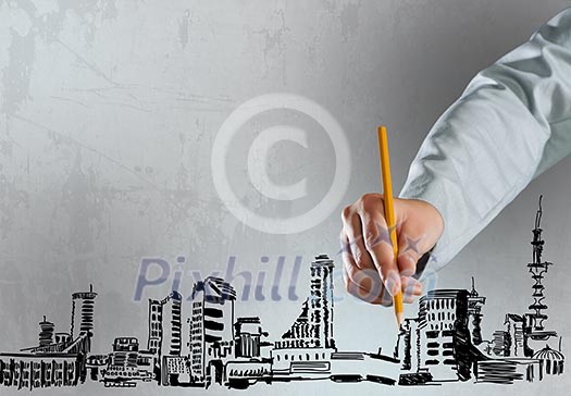 Close up of businesswoman hand drawing business sketches