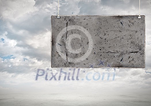 Cement blank hanging banner. Place for text Cement blank hanging banner. Place for text