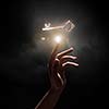 Close up of woman hand touching golden key