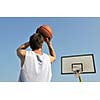 basketball player practicing and posing for basketball and sports athlete concept