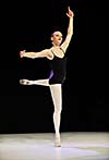 young happy ballet girl ballerina perform dance on stage at ballet school class