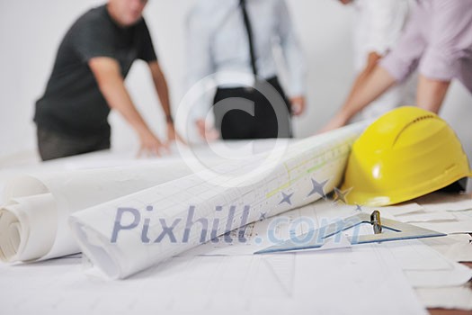 Team of architects people in group on construciton site check documents and business workflow Team of architects people in group on construciton site check documents and business workflow