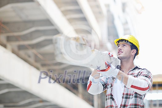 handsome hard worker people portrait at concstruction site handsome hard worker people portrait at concstruction site