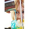 female bartender making coctail alcohol drink isolated on white background in studio