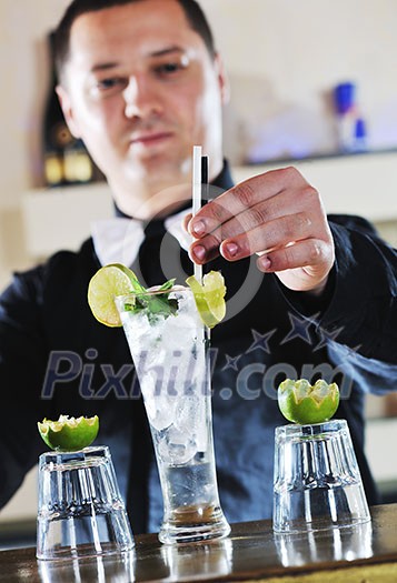 pro barman prepare coctail drink and representing nightlife and party event concept pro barman prepare coctail drink and representing nightlife and party event concept