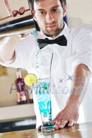 pro barman prepare coctail drink and representing nightlife and party event concept pro barman prepare coctail drink and representing nightlife and party event concept