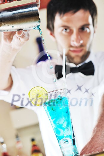 pro barman prepare coctail drink and representing nightlife and party event concept pro barman prepare coctail drink and representing nightlife and party event concept
