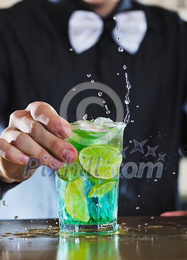 pro barman prepare coctail drink and representing nightlife and party event concept pro barman prepare coctail drink and representing nightlife and party event concept