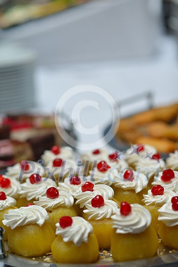 people group catering buffet food indoor in luxury restaurant with meat colorful fruits and vegetables people group catering buffet food indoor in luxury restaurant with meat colorful fruits and vegetables