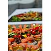 people group catering buffet food indoor in luxury restaurant with meat colorful fruits  and vegetables