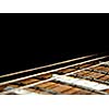 music concept with red electric guitar isolated on black background in dark