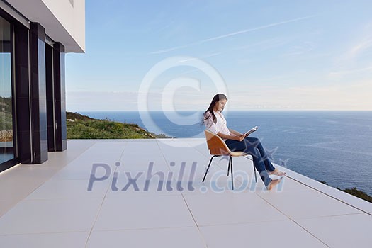 happy young woman relaxing at home happy young woman relaxing at home