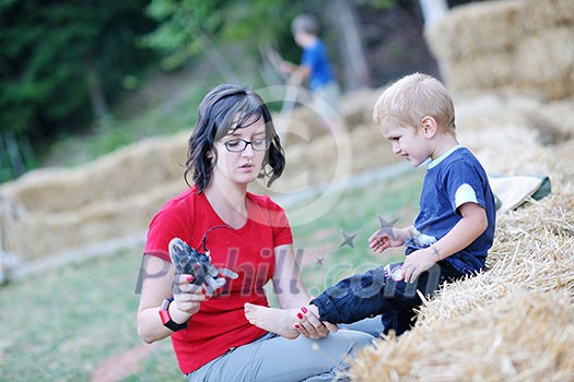 woman and child have fun outdoor at partk in nature woman and child have fun outdoor at partk in nature